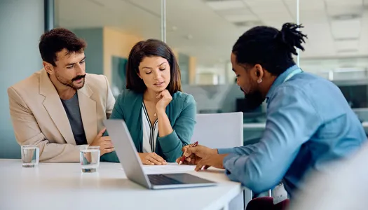 couple meeting with financial advisor