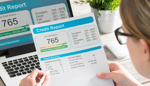 woman looking at credit report