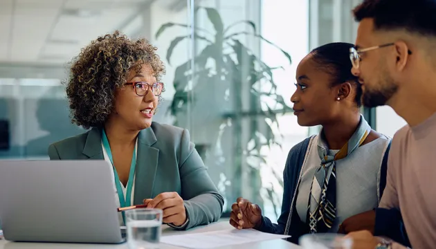 couple talking to financial advisor