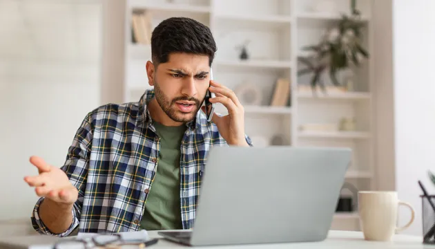 frustrated man on cellphone