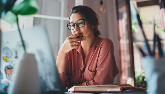 woman looking at computer